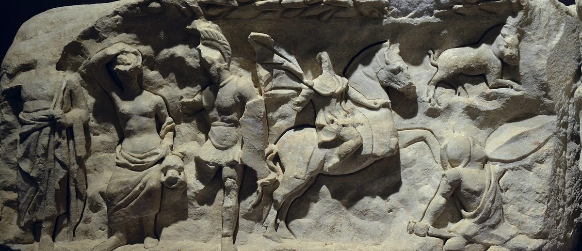 A marble relief panel from the Temple of Hadrian in the Ephesus Museum, showing Androclus hunting the boar that founded the city