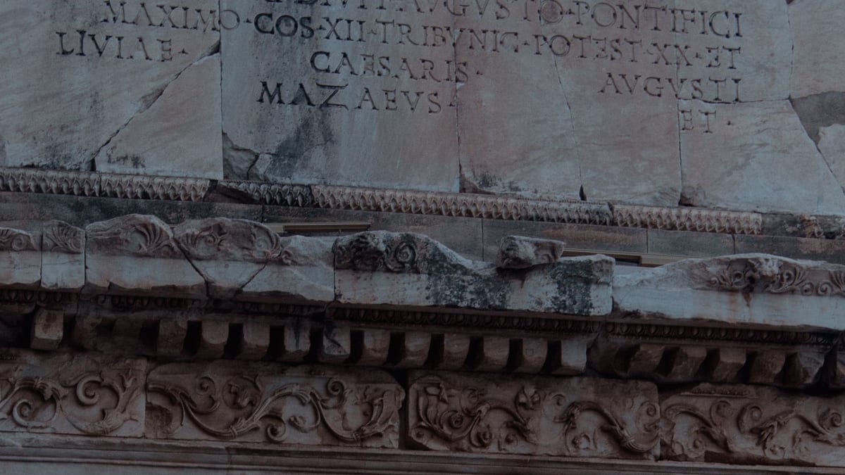 Latin inscription in Roman capitals on the Gate of Mazaeus and Mithridates at Ephesus, with the words LIVIAE, CAESARIS, AVGVSTI and MAZAEVS above a carved frieze