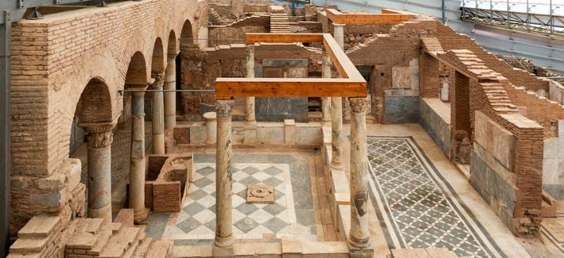 Colonnaded courtyard inside the Terrace Houses at Ephesus with a checkerboard marble floor
